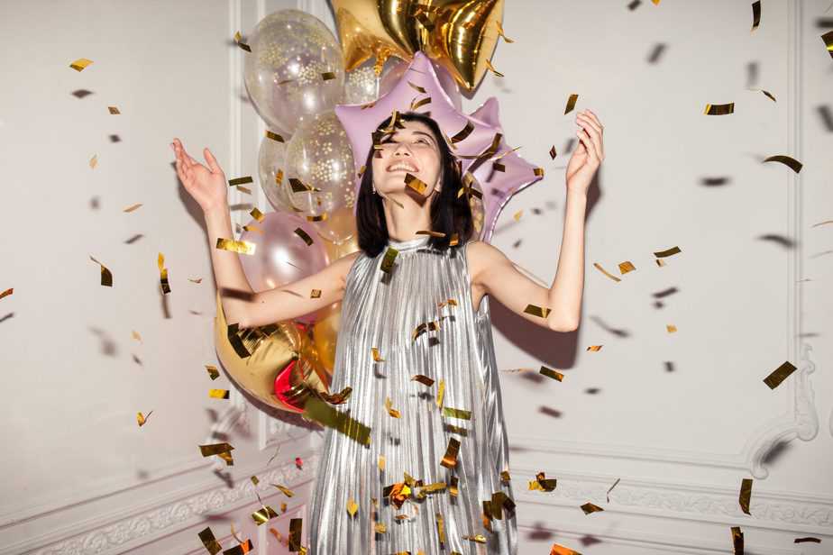 woman-celebrating-with-confetti